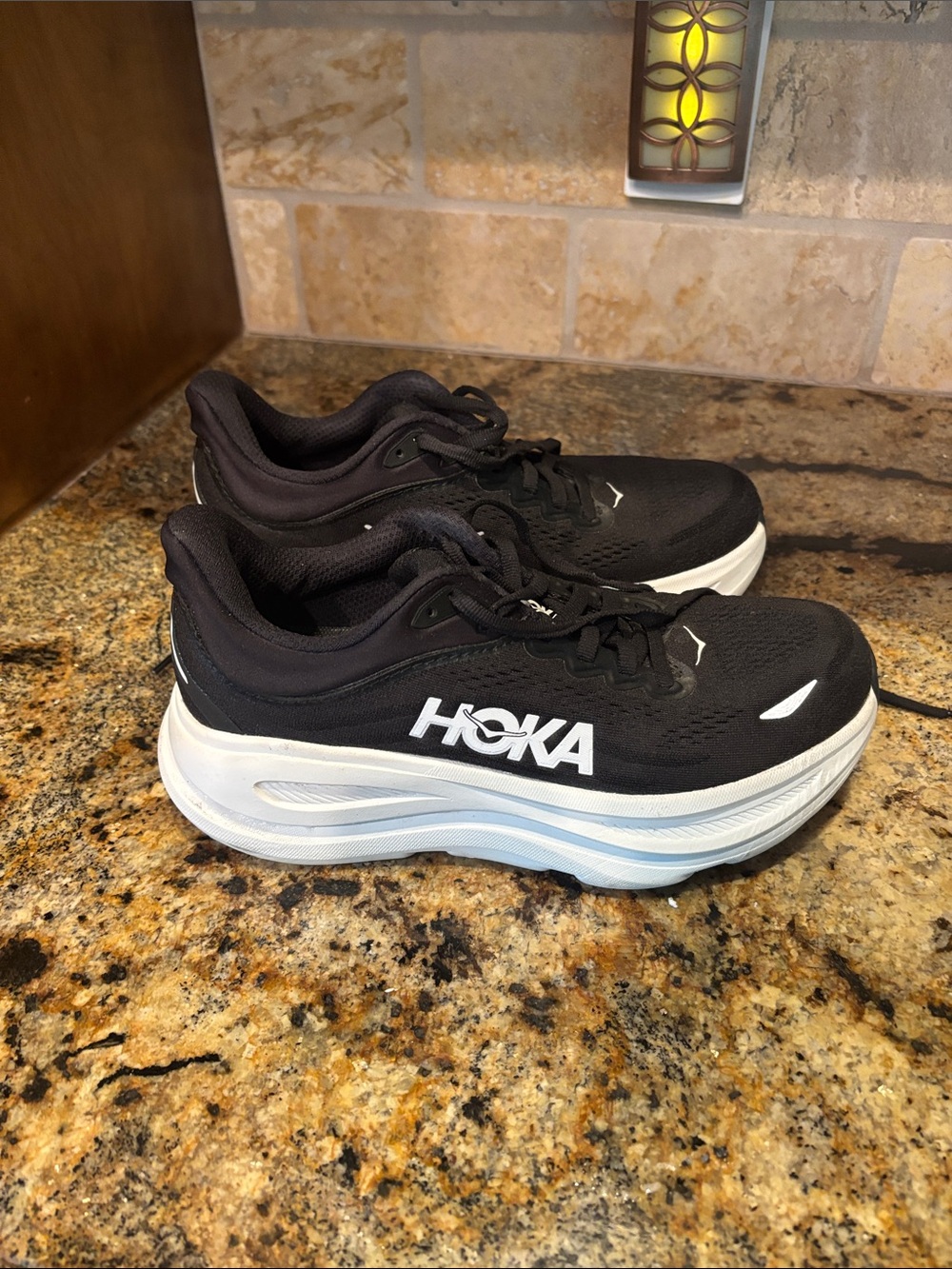 Hoka Women's Black and White Max-Cushion Road Runners